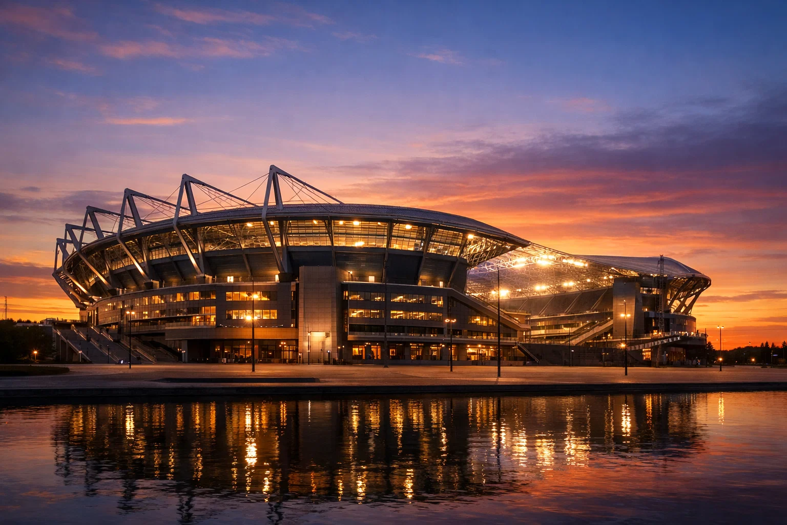 Fußballstadion in der Abenddämmerung mit warmem Licht